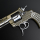 Illustration for article titled Worlds Smallest Gun Now In Gold and Diamonds, Kills Just the Same
